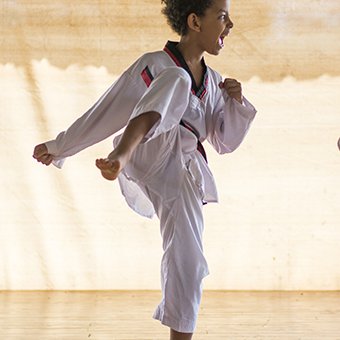 Child participates in taekwondo